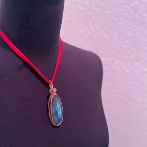 🦇 SOLD 🦇 Copper wire wrapped Labradorite crystal strung on red deer lace.